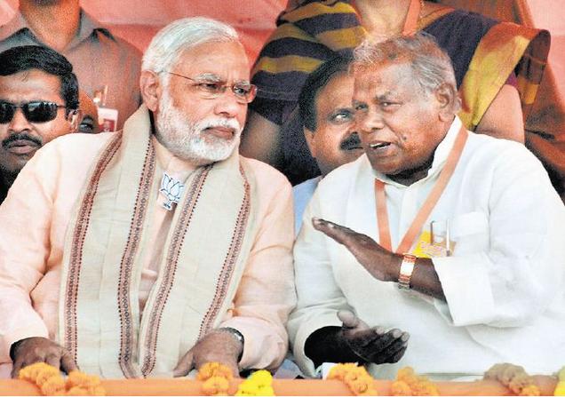 Prime Minister Narendra Modi with Jitan Ram Manjhi at a meeting at Sasaram in Rohtas district of Bihar on Friday