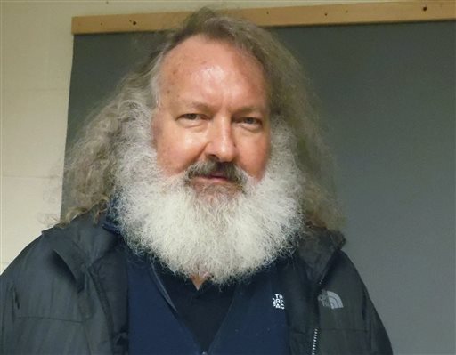 Vermont State Police actor Randy Quaid stands in the Vermont State Police barracks in St. Albans Vt. In a hearing Monday Oct. 12 2015 in St. Albans Quaid was ordered held on $500,000 bail on char