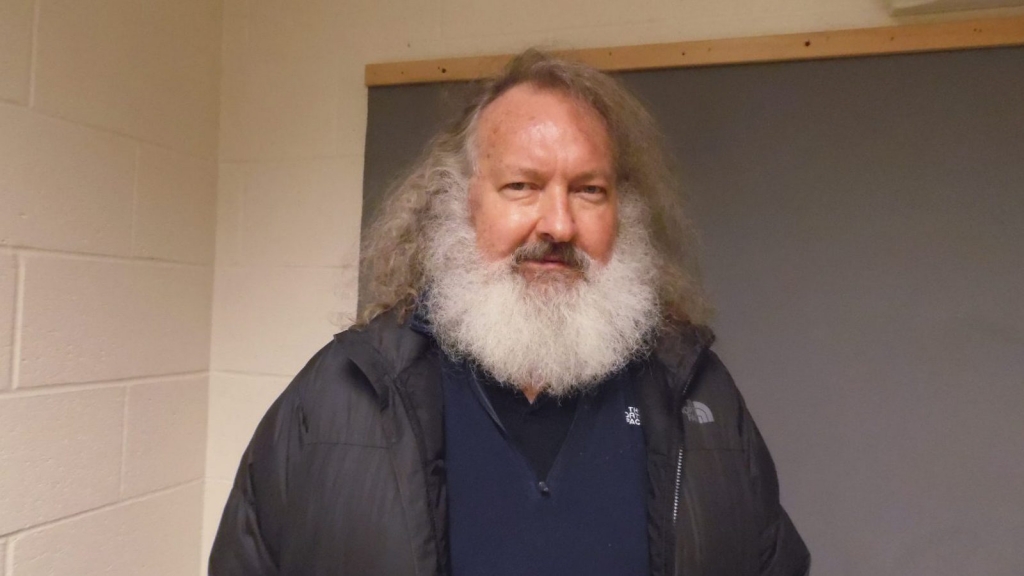 Vermont State Police actor Randy Quaid stands in the Vermont State Police barracks in St. Albans Vt. Friday Oct. 9 2015. State Police say Quaid has been taken into custody while trying to cross from Canada into the United S