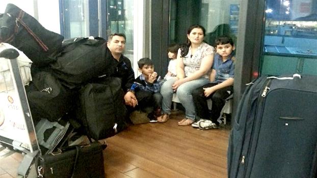 Photos: A family of Kurdish refugees is living in a Moscow airport lounge