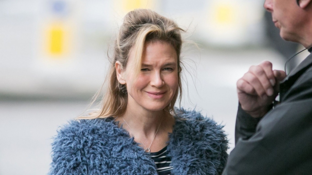 Renee Zellweger shows off her fake baby bump as she shoots scenes for Bridget Jones's Baby