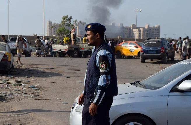 Yemeni security forces patrol after Sheikh bin Farid palace, used as a base by the Saudi-led coalition forces was hit by a rocket attack