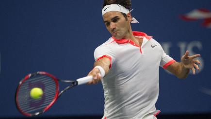 Defending champion Roger Federer was dumped out of the Shanghai Masters on Tuesday