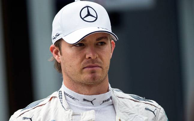 Rosberg pipped team-mate Hamilton to claim pole position for Mercedes