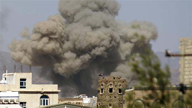 Smoke billows from buildings targeted by Saudi airstrikes at al Dailami air base north of the capital Sana’a