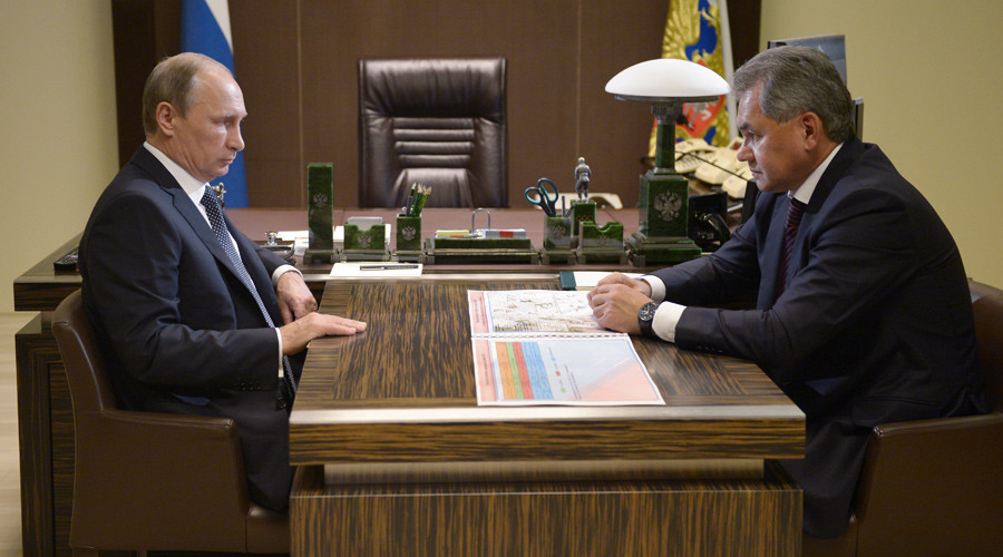 President Vladimir Putin at a meeting with Defense Minister Sergey Shoigu at the Bocharov Ruchei residence