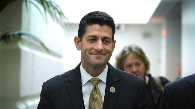 US Representative Paul Ryan leaves after a House Republican Conference meeting