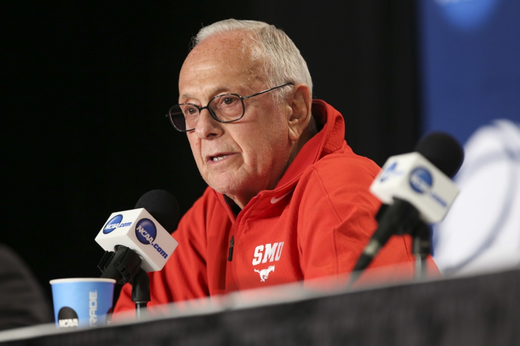 SMU head coach Larry Brown speaks to the media during a news conference before practice at the NCAA college basketball tournament in Louisville Ky. Wednesday