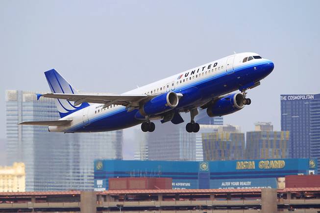 Sam Morris A United Airlines jet takes off from Mc Carran International Airport on Friday Aug. 26 2011