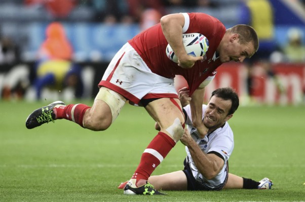 AFP  File  Bertrand LangloisCanada's centre Nick Blevins is tackled during the Pool D match of the 2015 Rugby World Cup between Canada and Romania at Leicester City Stadium in Leicester central England