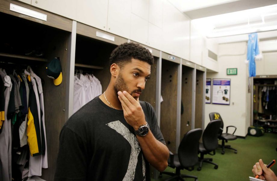 Oakland Athletics shortstop Marcus Semien answers questions in the clubhouse during an end-of-season media availability Monday Oct. 5 2015 in Oakland Calif