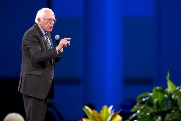 Democratic presidential candidate Bernie Sanders speaks during the 2015 Jefferson Jackson Dinner with fellow candidates Hillary Clinton and Martin O´Malley in Des Moines Iowa