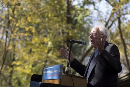 U.S. Democratic presidential candidate Bernie Sanders talks to supporters at a fundraising house party at the home of Gerhild Krapf and Michael Brau in Iowa City Iowa