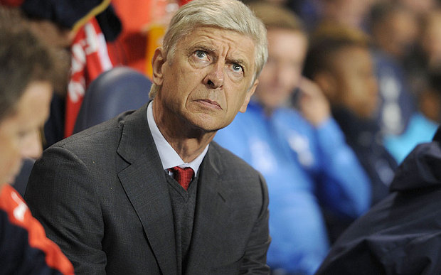 Arsene Wenger hits back at Gary Neville over Arsenal's'naive tactics