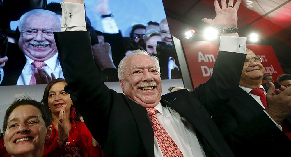 Mayor and province governor of Vienna Michael Haeupl of the Social Democratic Party celebrates in front of supporters after winning regional elections in Vienna Austria