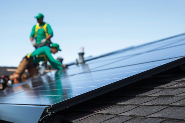 SolarCity workers installing rooftop panels.  	  		Credit	  		  		SolarCity