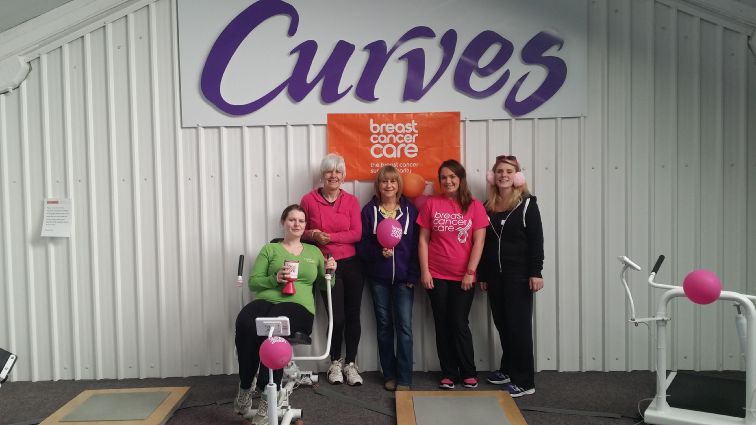 Staff from Curves gym in Workington who have filled October with fund-raising events for Breast Cancer Care