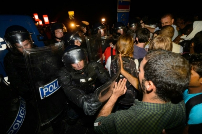 Standoff between refugees crossing over the Slovenian border