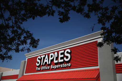 The sign logo for a Staples store is seen on Feb. 3 2015 in Miami Fl