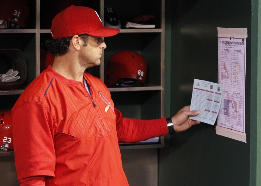 Sep 28 2015 Pittsburgh PA USA St. Louis Cardinals manager Mike Matheny checks his line-up card in the dugout before playing the Pittsburgh Pirates at PNC Park. Mandatory Credit Charles LeClaire-USA TODAY Sports