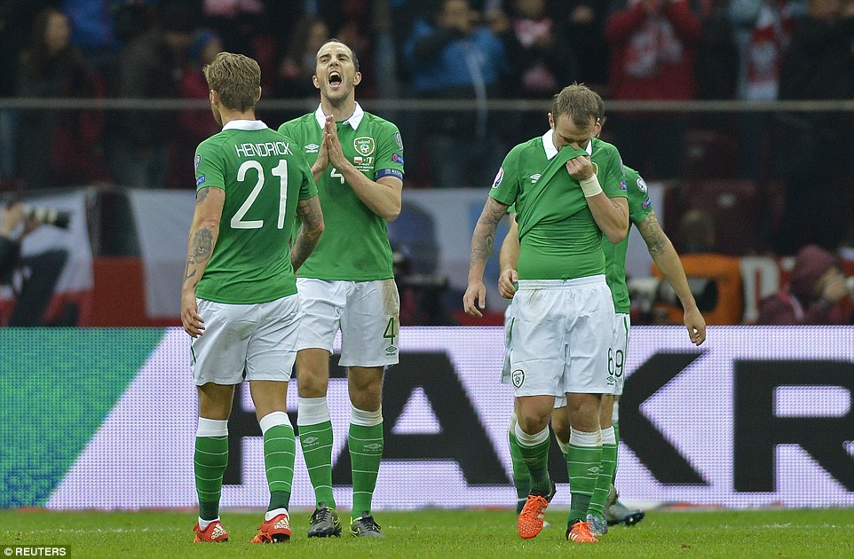 Sunderland defender John O'Shea puts his hands together in prayer after seeing his side go behind for the second time against Poland