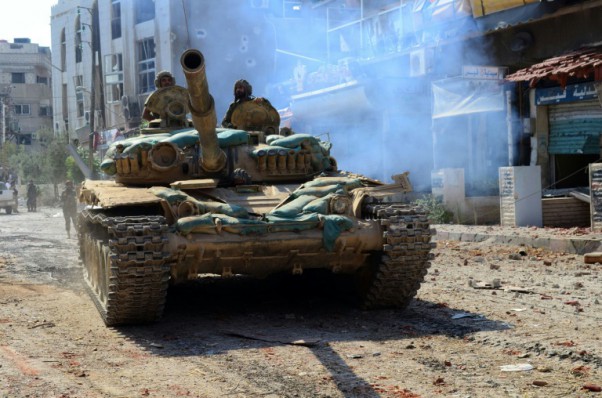 Syrian Arab News Agency  AFP  File  A Syrian army tank in Mleiha on the outskirts of Damascus