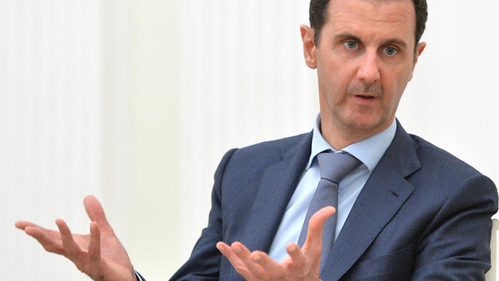 Syrian President Bashar al Assad says his country must'eradicate terrorism.      
        
            
    
               Show Grid