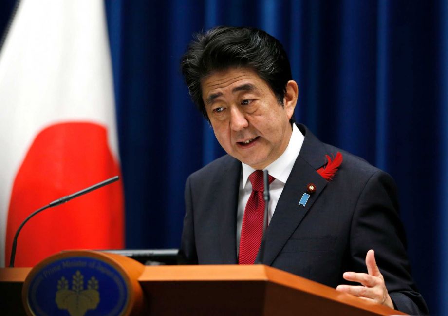 Japan's Prime Minister Shinzo Abe speaks about the agreement on the Trans Pacific Partnership trade deal at Abe's official residence in Tokyo Tuesday Oct. 6 2015