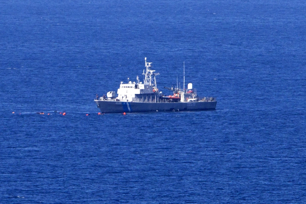 The Greek rescue vessel collided with an old wooden boat of refugees