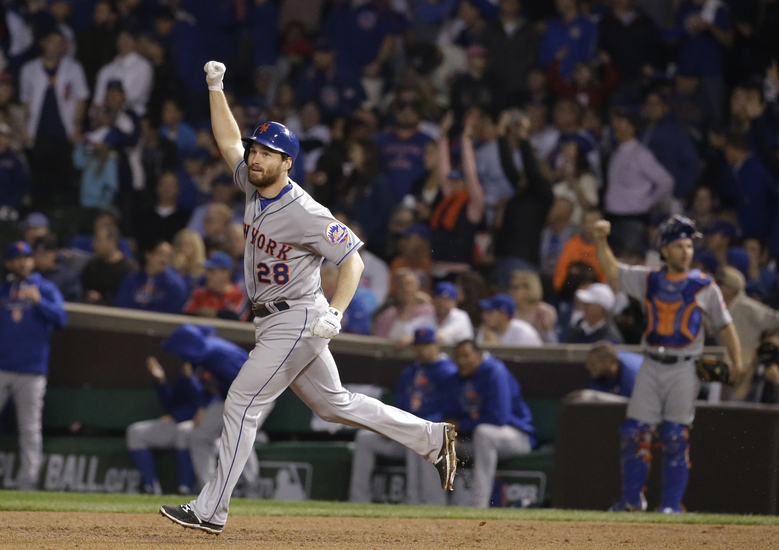 The New York Mets’ Daniel Murphy celebrates a home run that prolongs the Cubs’ Murphy curse