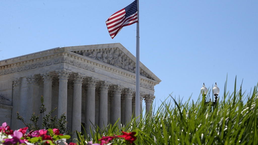 An American flag flies over the Supreme Court in June