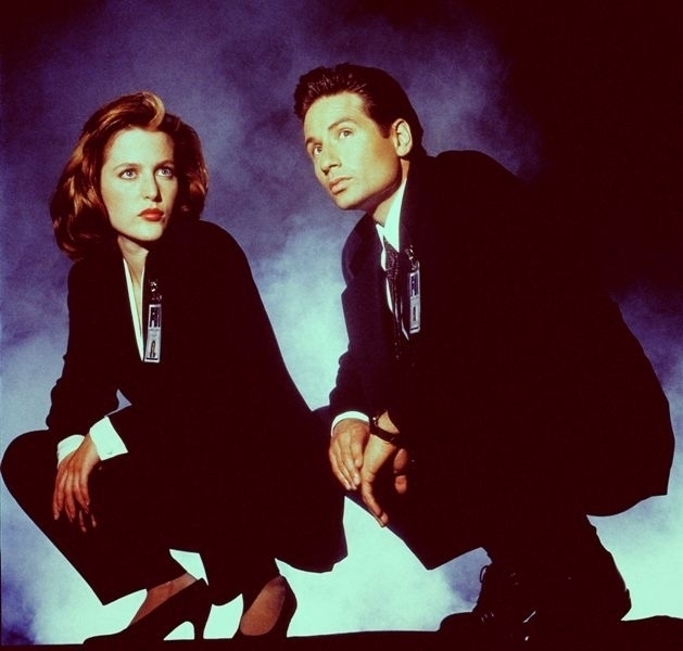 Gillian Anderson as Dana Scully and David Duchovny as Fox Mulder