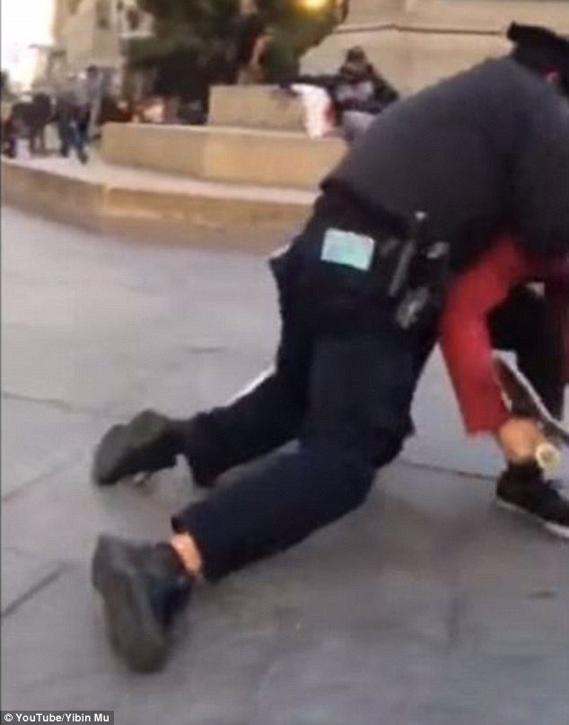 The aggressive altercation lasted more than two minutes as the NYPD officer tried to wrestle Mu 22 to the ground