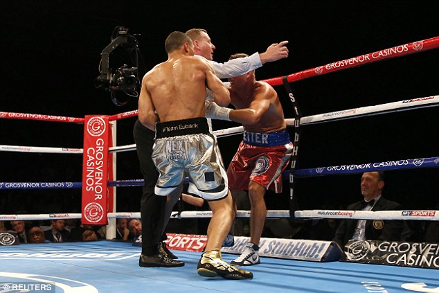 The referee stops the fight with Chris Eubank Jnr dominating Tony Jeter whose back was against the ropes