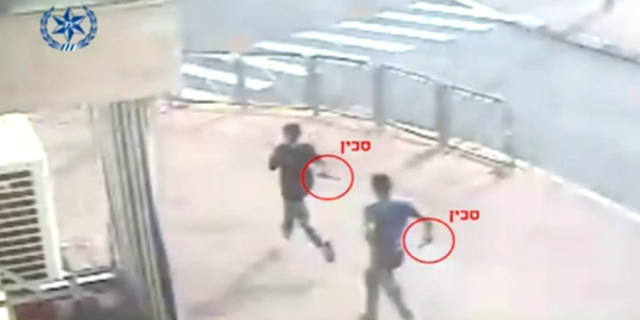 Police footage of Palestinian terrorists carrying knives in Pisgat Zeev. Credit Israel Police