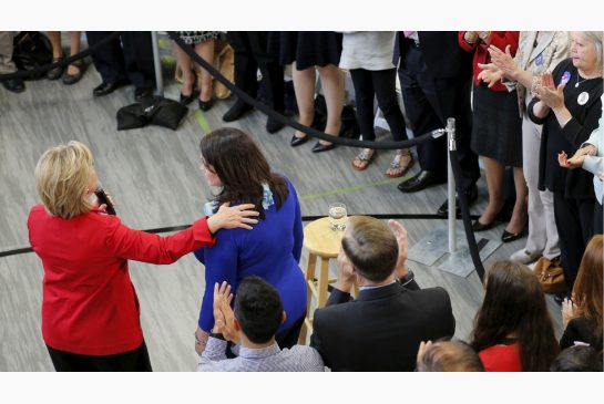 U.S. Democratic presidential candidate Hillary Clinton is joined by Nicole Hockley, mother of Sandy Hook Elementary School shooting victim Dylan at a campaign town hall meeting in Manchester New Hampshire