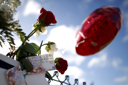 A note for one of the Umpqua Community College shooting victims is seen outside the college in Roseburg Oregon United States