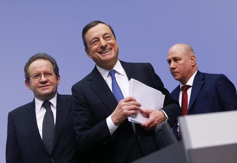 European Central Bank President Mario Draghi and Vice President Vitor Constancio leave after addressing an ECB news conference in Frankfurt