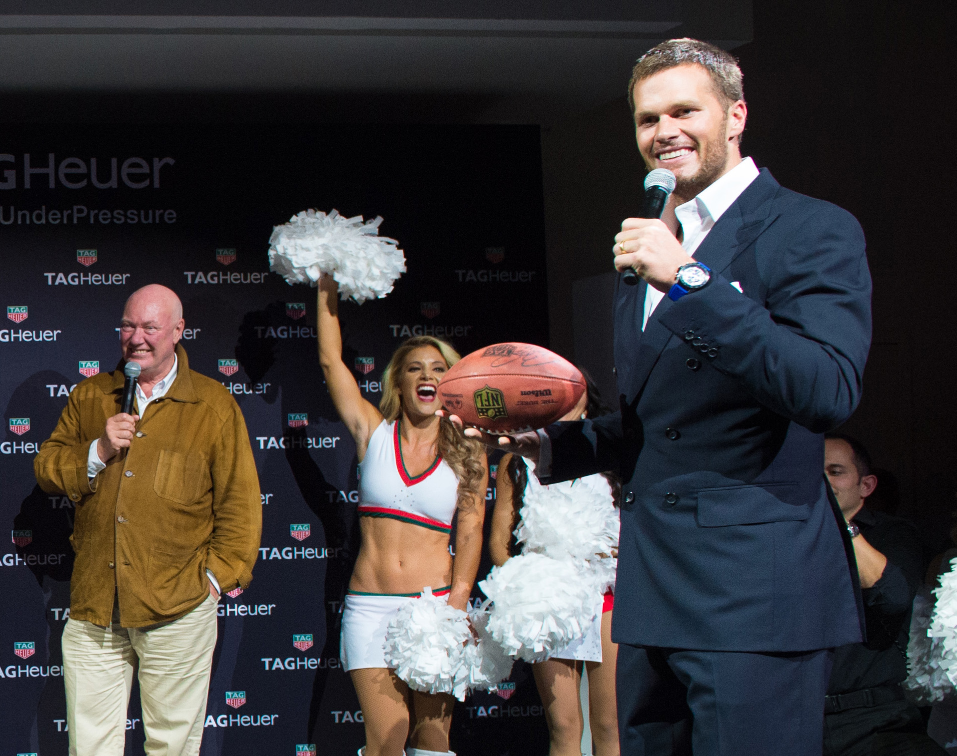 New England Patriots quarterback and newly-named brand ambassador Tom Brady holds a football at a TAG Heuer product launch at Spring Studios on Tuesday Oct. 13 2015 in New York