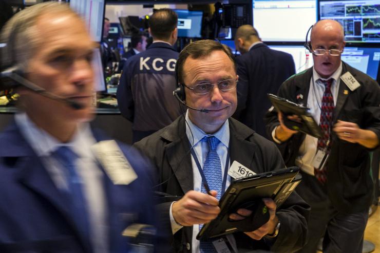 Traders work on the floor of the New York Stock Exchange shortly after the opening of the markets in New York. Oct. 14 2015.   
           
    Reuters  Lucas Jackson