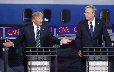 Republican U.S. presidential candidate businessman Donald Trump speaks as former Florida Governor and fellow candidate Jeb Bush looks on during the second official Republican presidential candidates debate of the 2016 U.S. presidential campaign at the