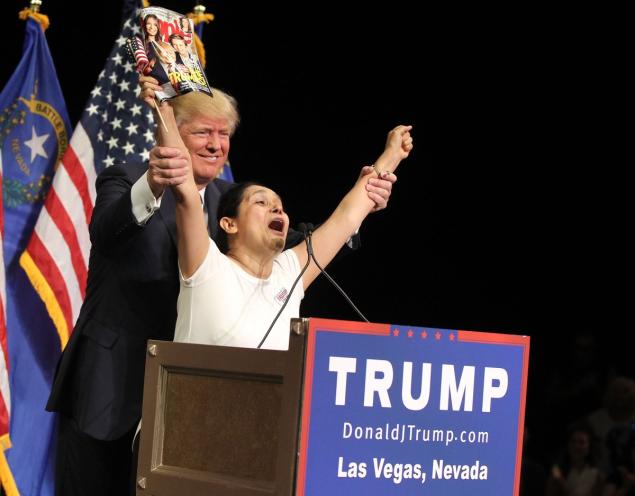 Republican presidential candidate Donald Trump invited supporter Myriam Witcher on stage at a Thursday campaign event in Las Vegas