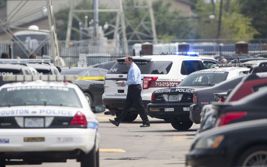 Houston Police vehicles respond after a shooting at Texas Southern University Friday Oct. 9 2015 in Houston. A student was killed and another person was wounded in a shooting outside a student-housing complex on Friday and police have detained at lea