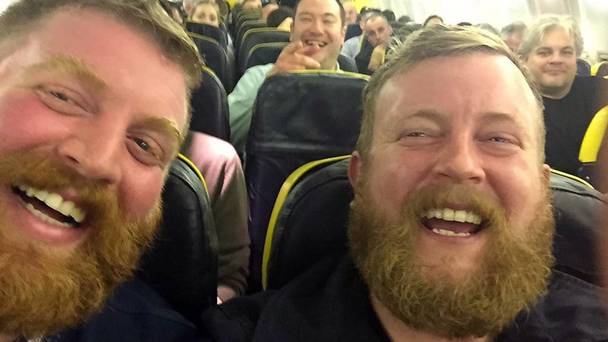 Two lookalike strangers found themselves sitting next to each other on a flight