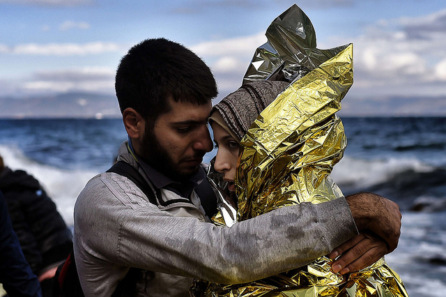 Two refugees after arriving on the Greek island of Lesbos