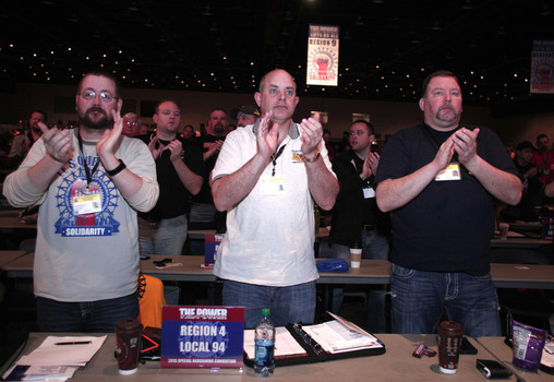 Members of the United Auto Workers listen to their leadership at a meeting early this year. Contract talks are continuing at Fiat Chrysler Plymouth following rejection of a proposal yesterday