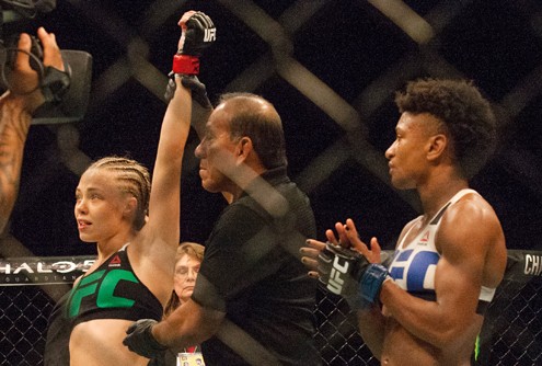 Rose Namajunas left is declared the winner after beating Angela Hill right during a mixed material arts bout at MMA UFC 192 Saturday Oct. 3 2015 in Houston