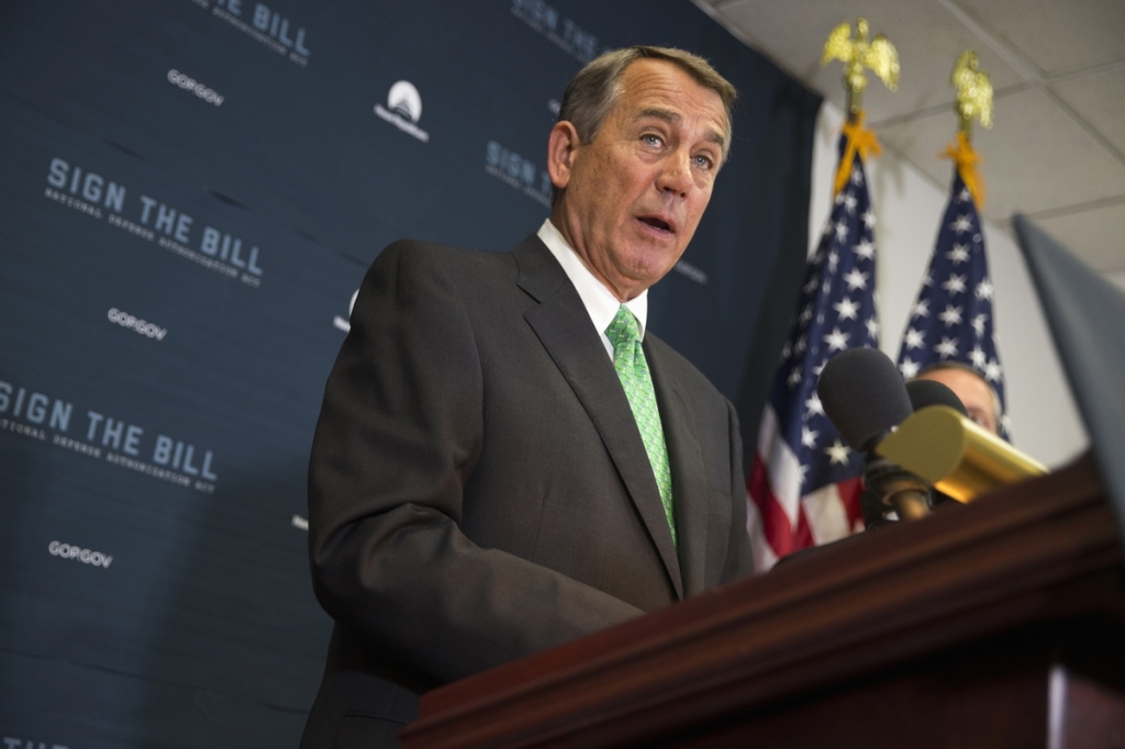 House Speaker John Boehner of Ohio speaks during a news conference on Capitol Hill in Washington. Lawmakers are pushing to finalize a sweeping deal to fund the federal government before Boehner leaves Congress at