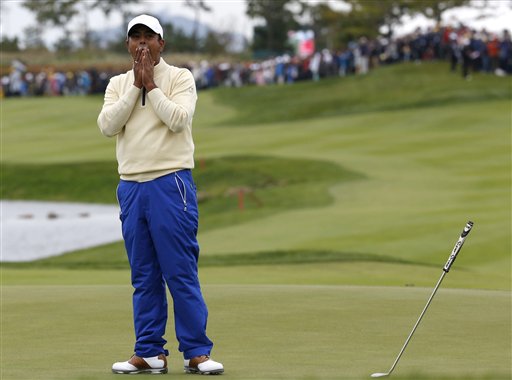 International team player Anirban Lahiri of India reacts on the 18th green after missing a putt to lose his match against United States&#039 Chris Kirk in their singles match at the Presidents Cup golf tournament at the Jack Nicklaus Golf Club Korea