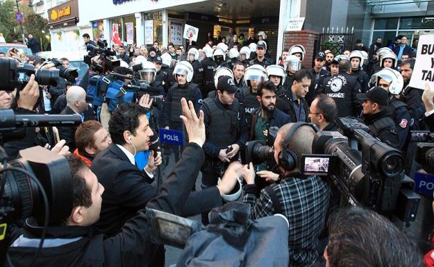 Police protests clash at'parallel state-linked company HQ